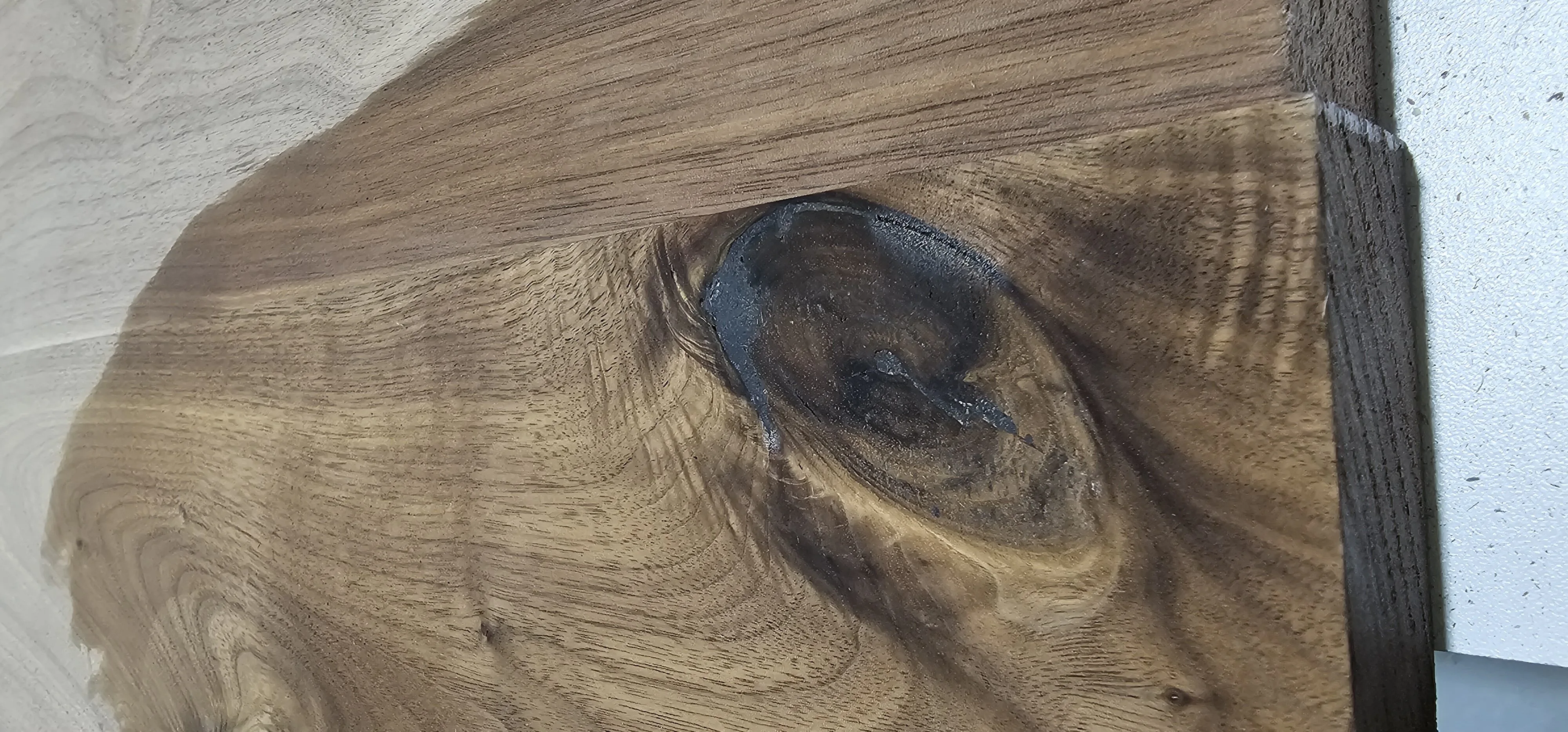 Walnut wood grain detail from a Meubles Ciano custom piece