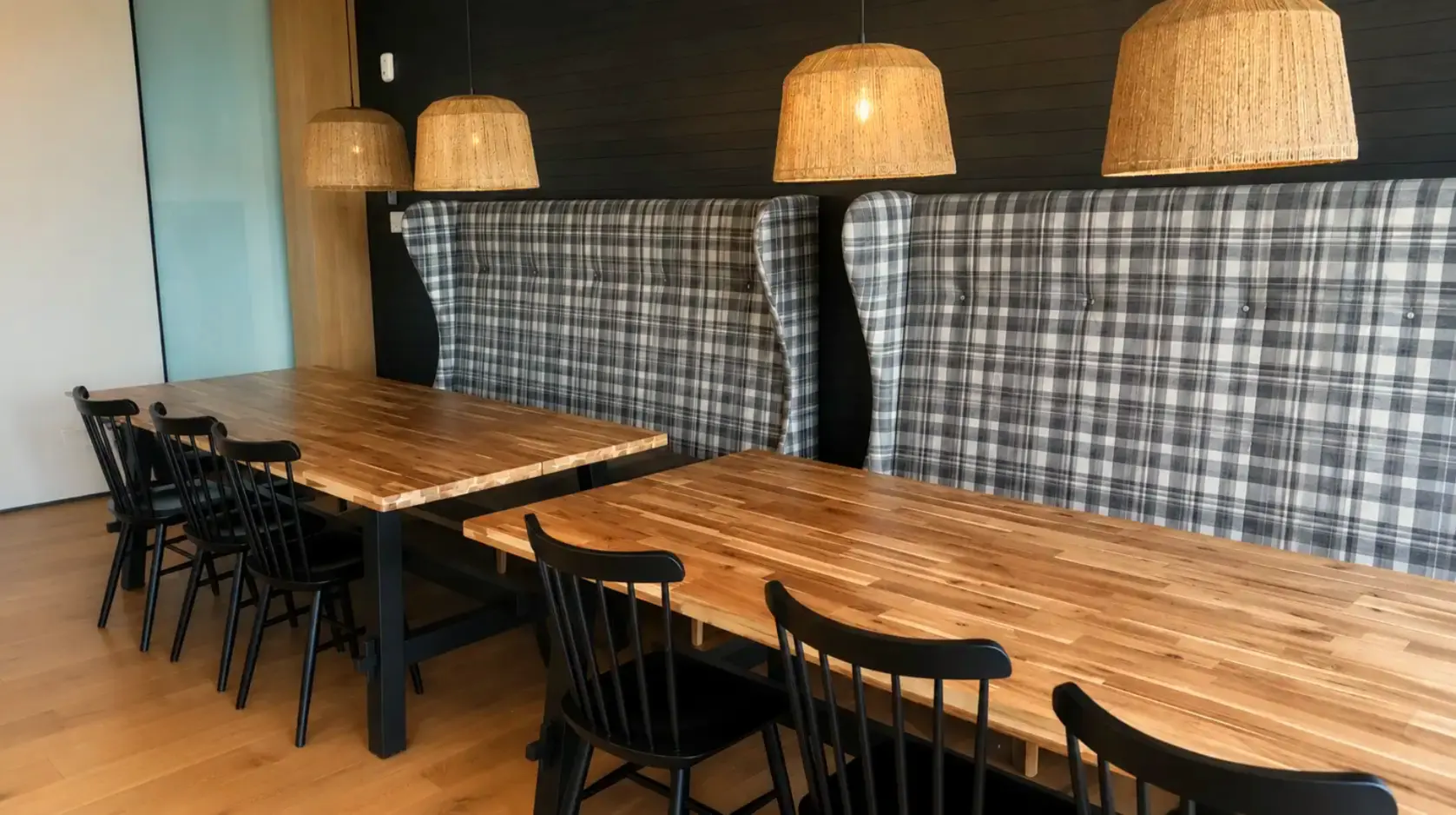 Upholstered wing banquettes and solid-wood tables built by Meubles Ciano for a Montréal restaurant