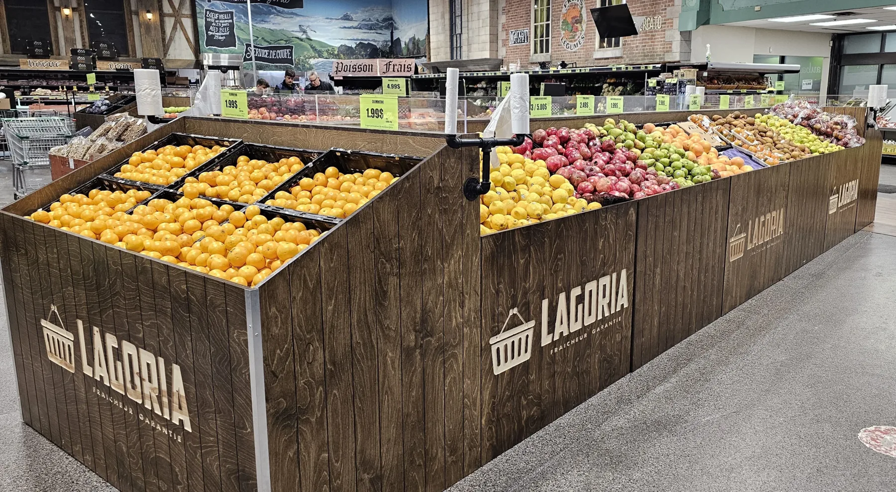 Branded produce display fixtures built for a Lagoria grocery by Meubles Ciano