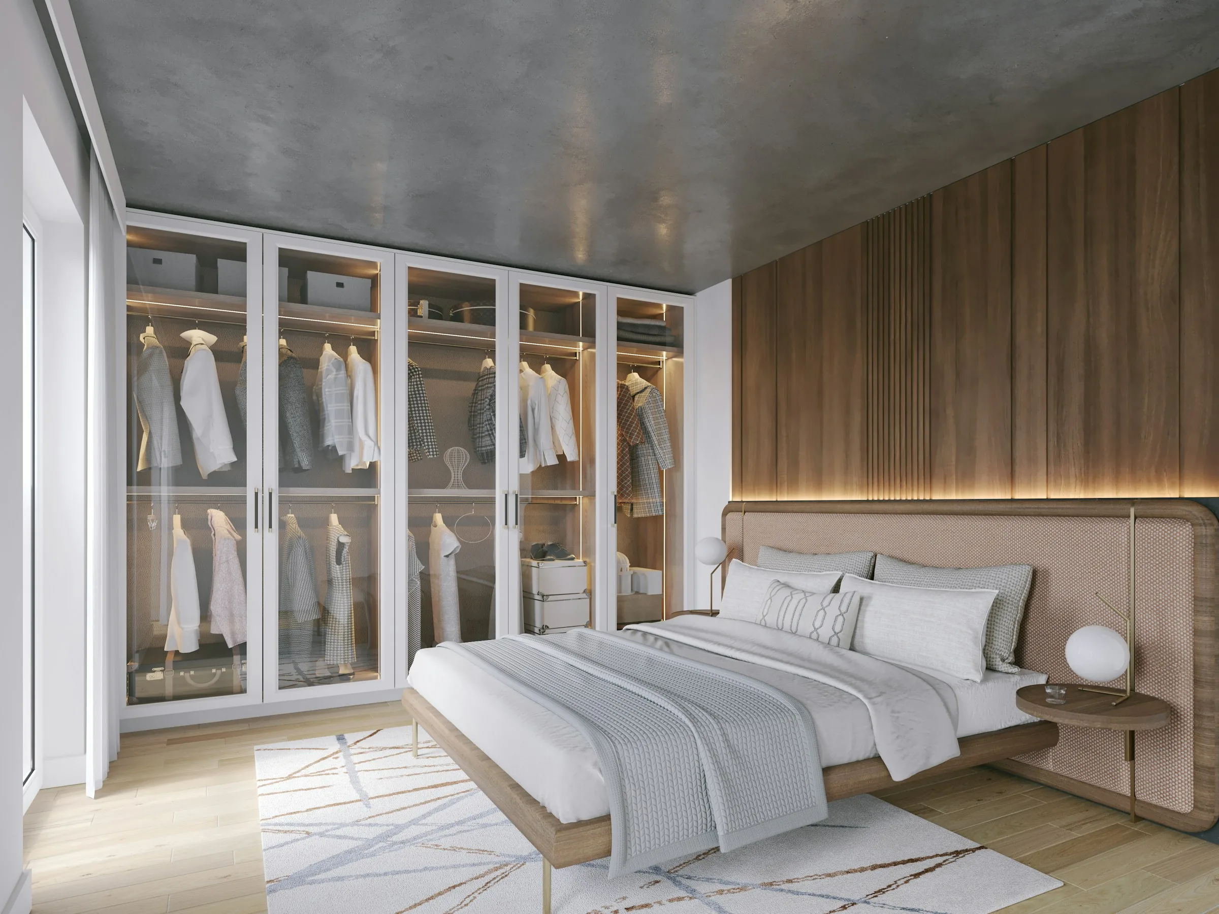 Glass-fronted wardrobe wall behind a low platform bed