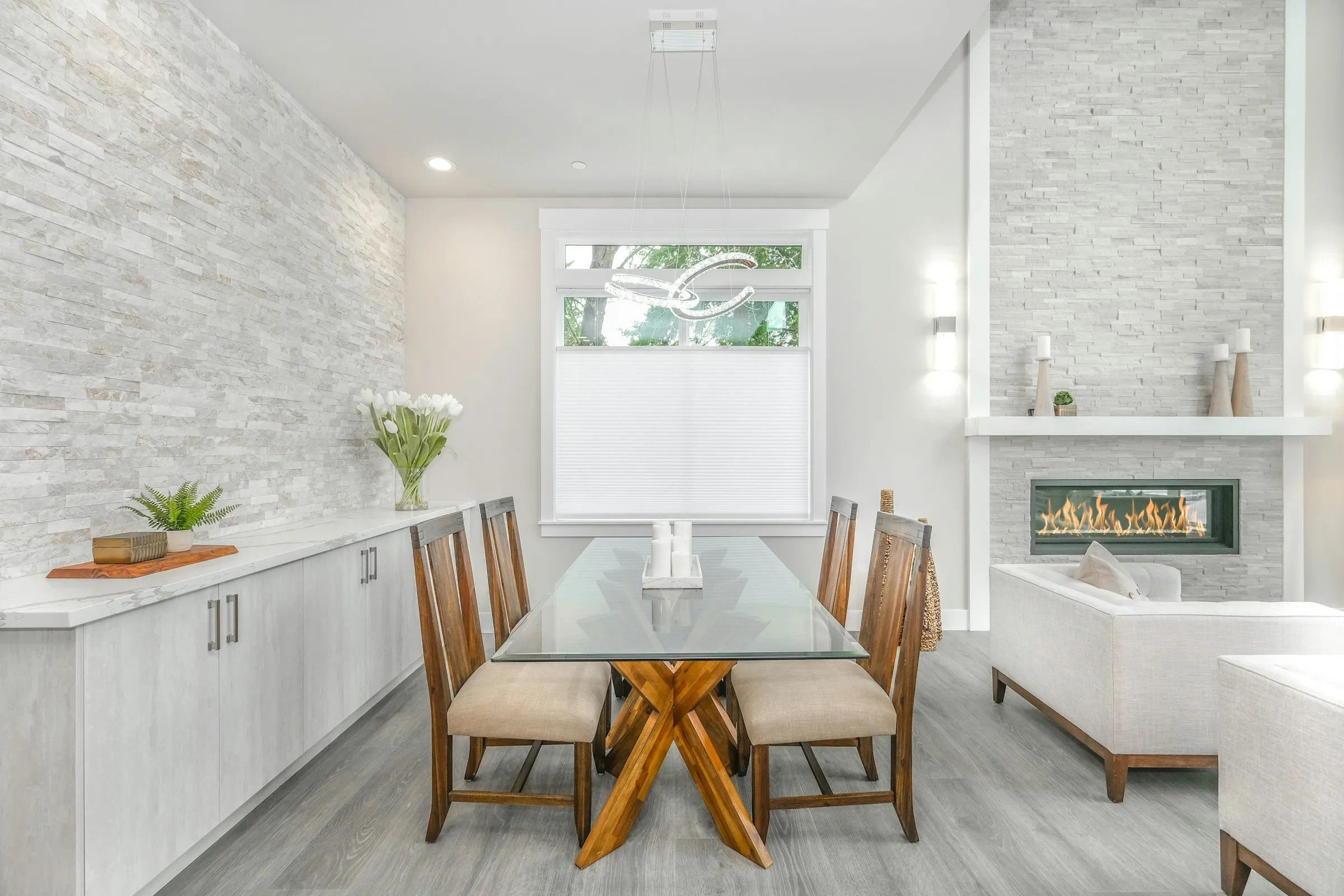 Dining room with a built-in white credenza run