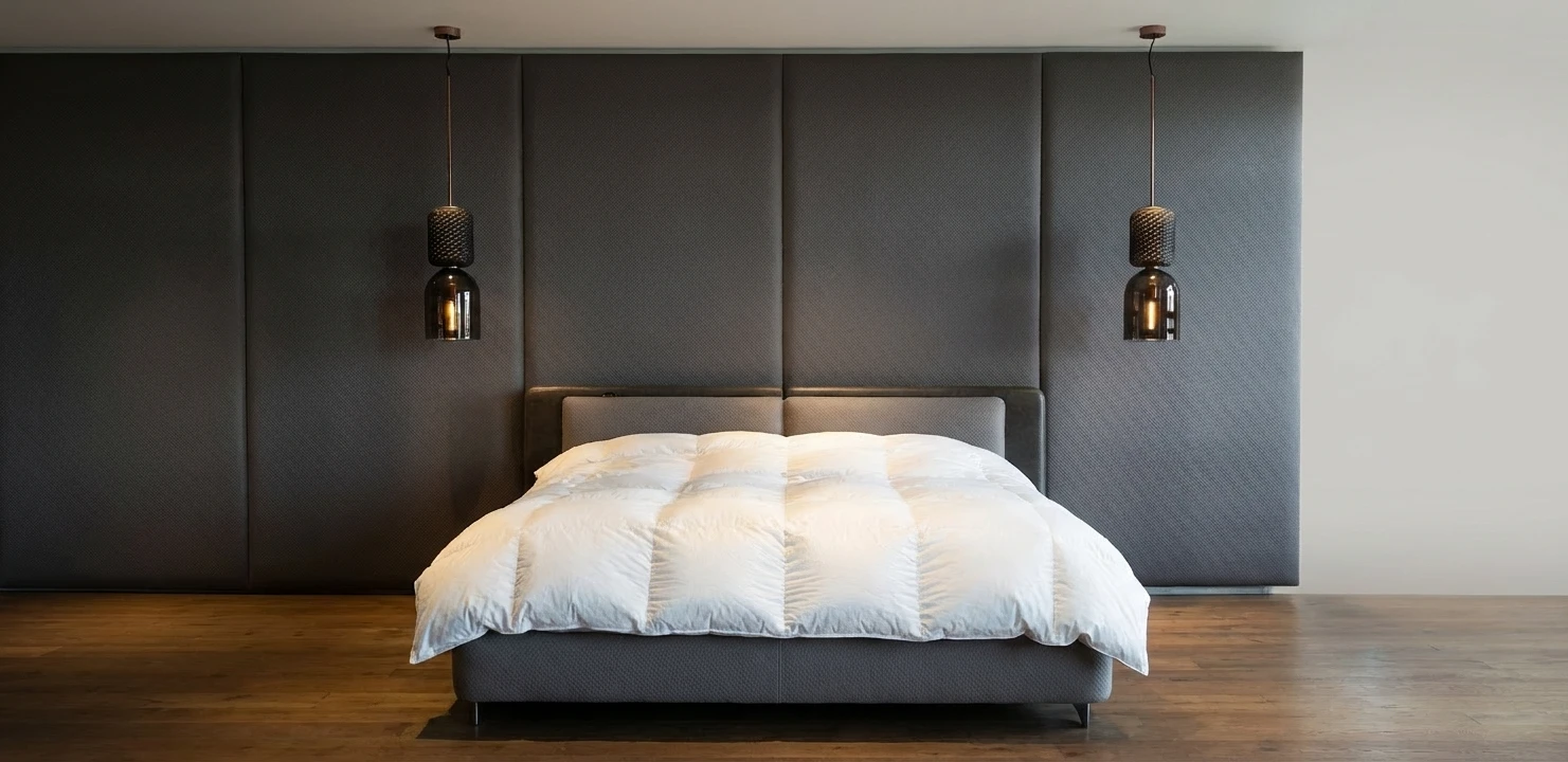 Upholstered wall panels and integrated millwork by Meubles Ciano